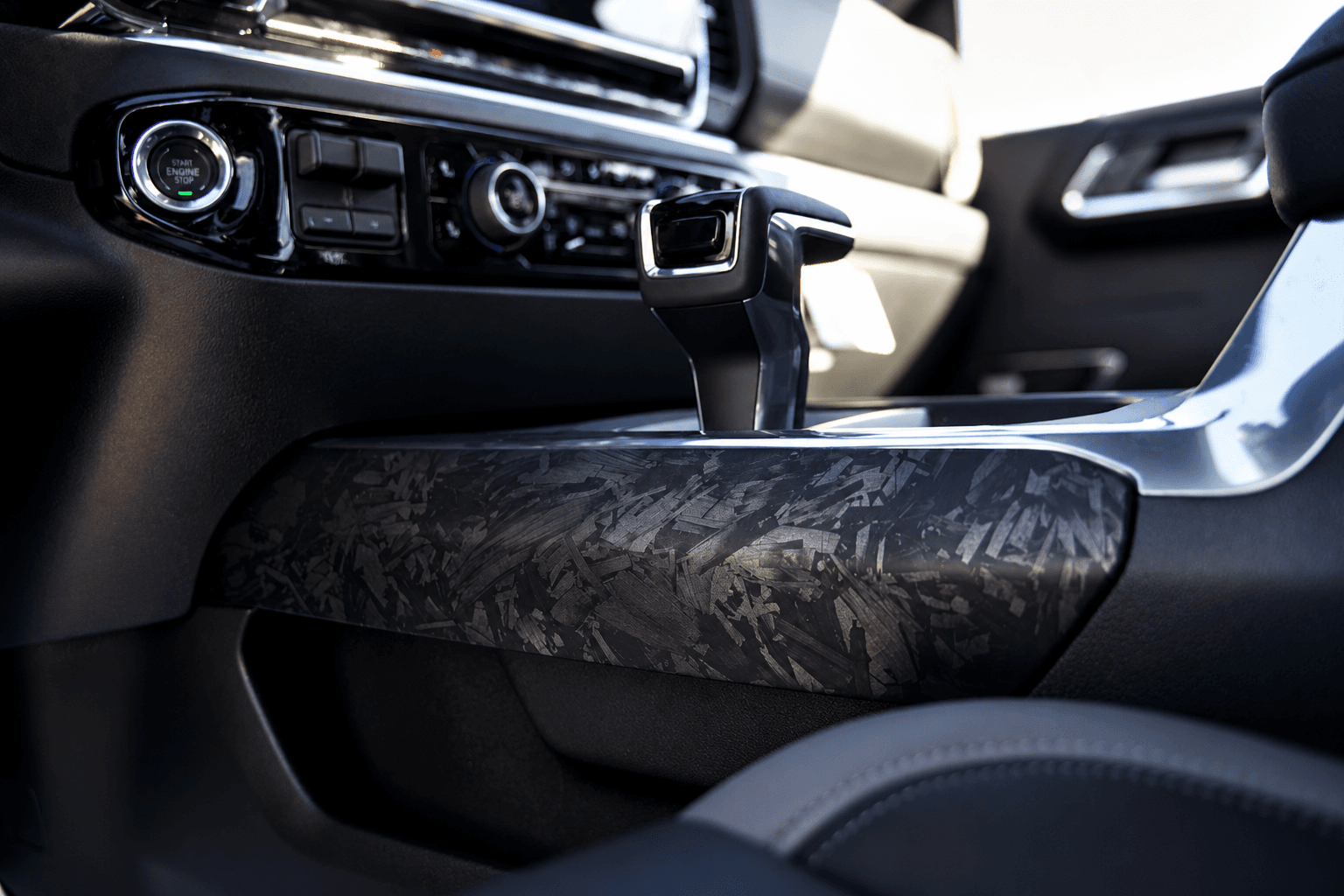 Low-angle front wheel view of the custom Chevy Silverado