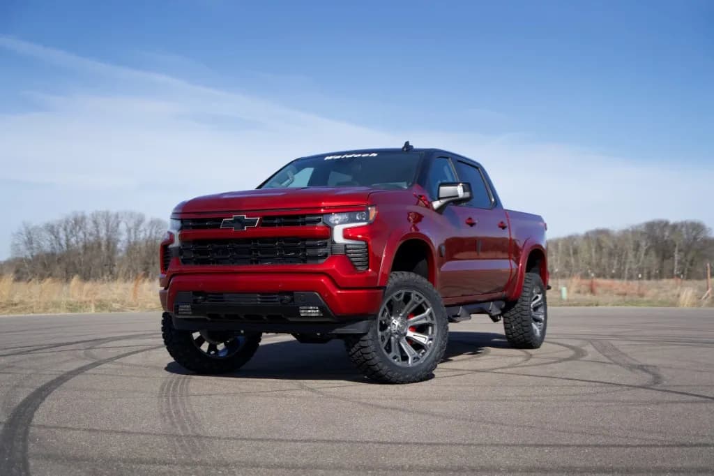 Front three-quarter view of the Radiant Red custom Chevy Silverado