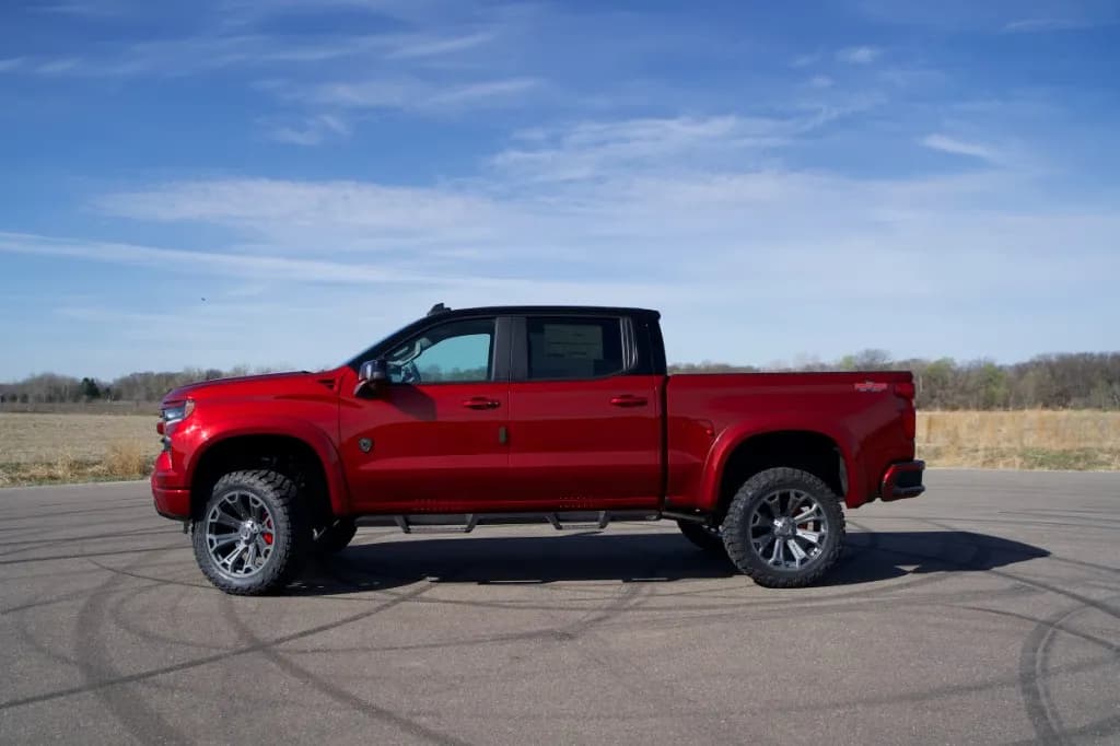 Side profile of the Radiant Red custom Chevy Silverado
